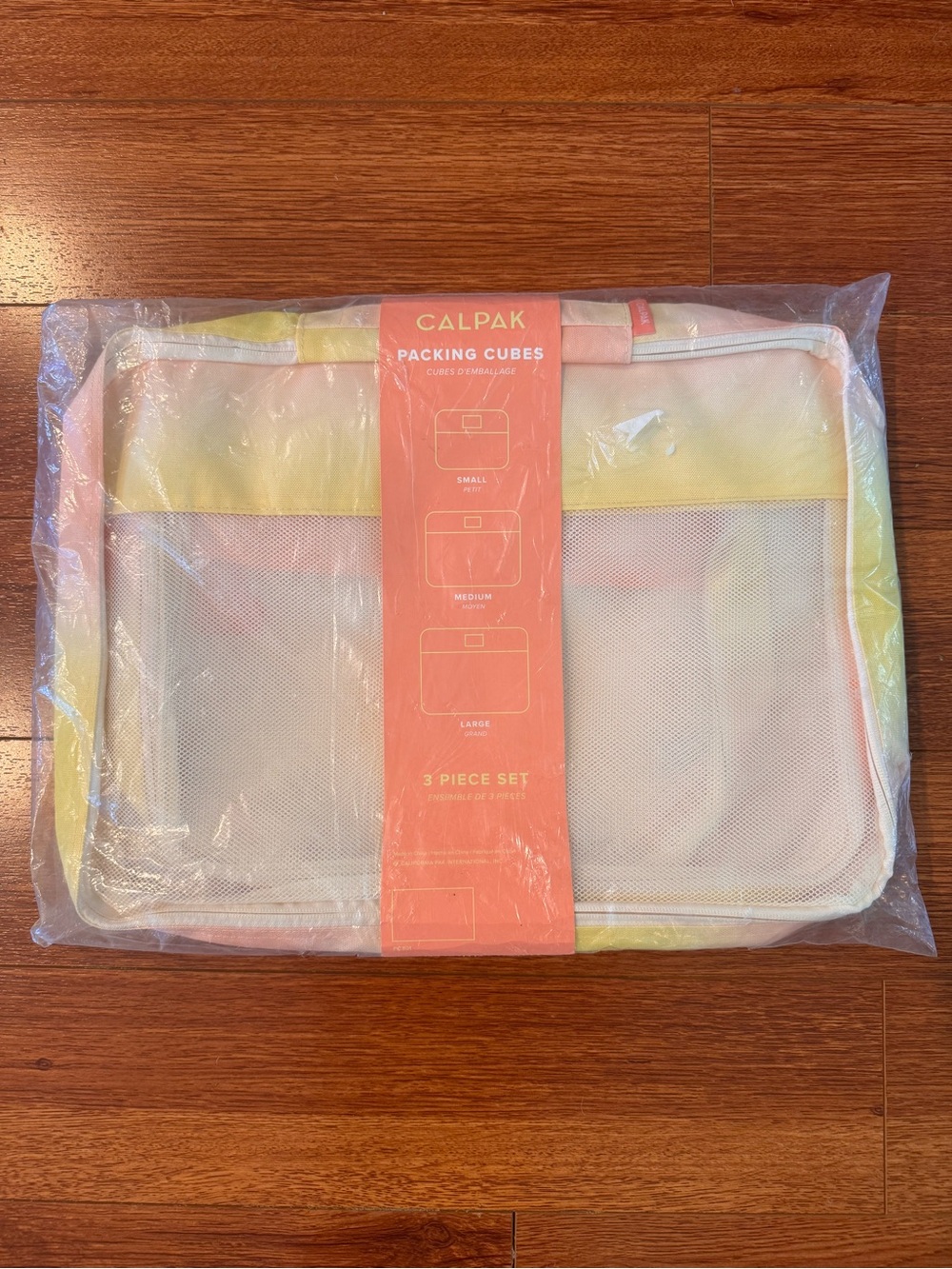 Calpak Packing Cubes 3-Piece Set in Pastel Yellow and Pink